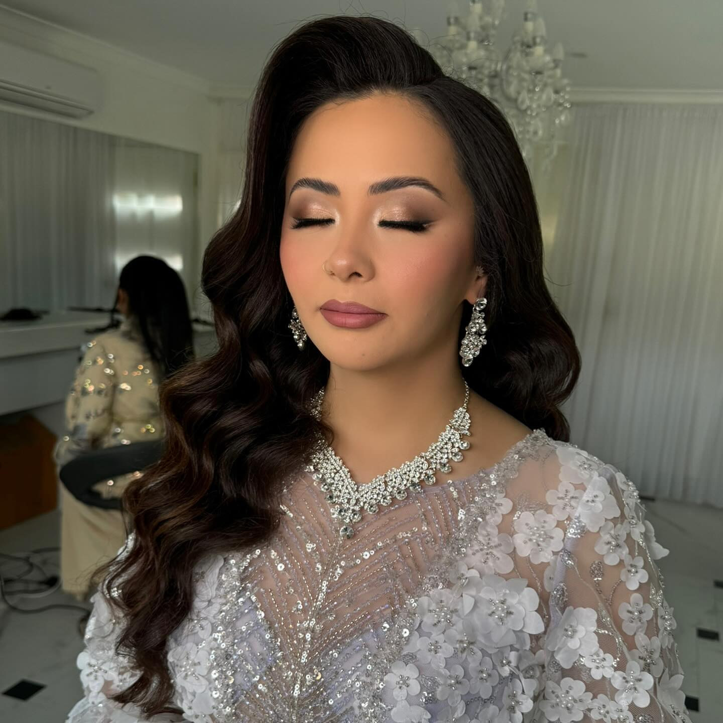 Engagement bride with jewelled necklace and soft waves