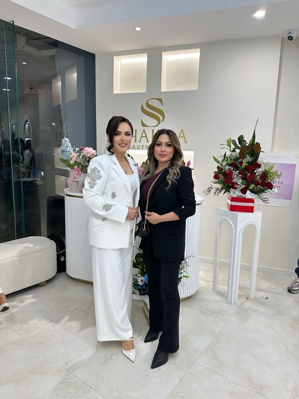 Shakila with her team in the lounge